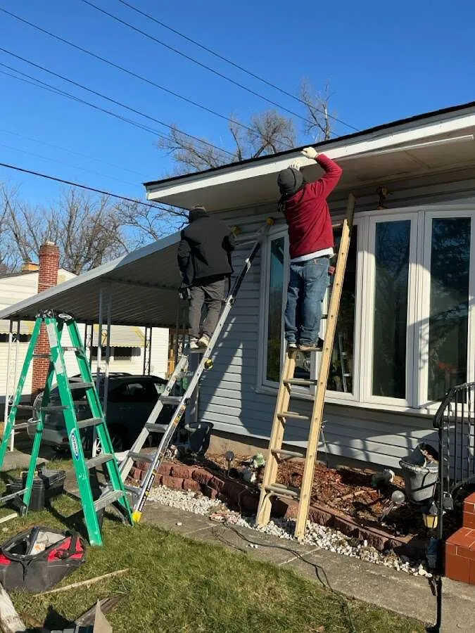 Restoration crew performing exterior repair in North Springfield