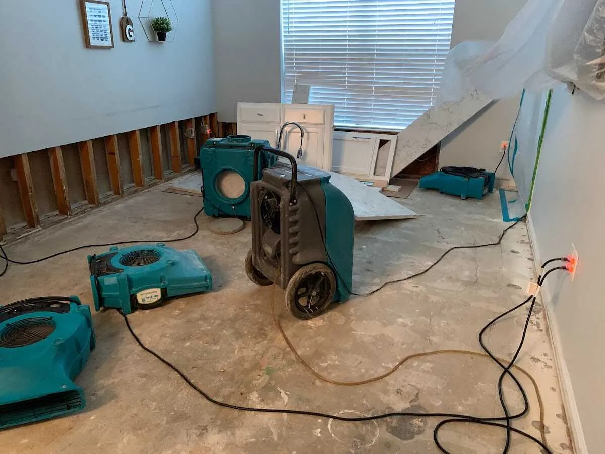 Dehumidifier in flood-cut room for Water Damage Restoration in North Springfield